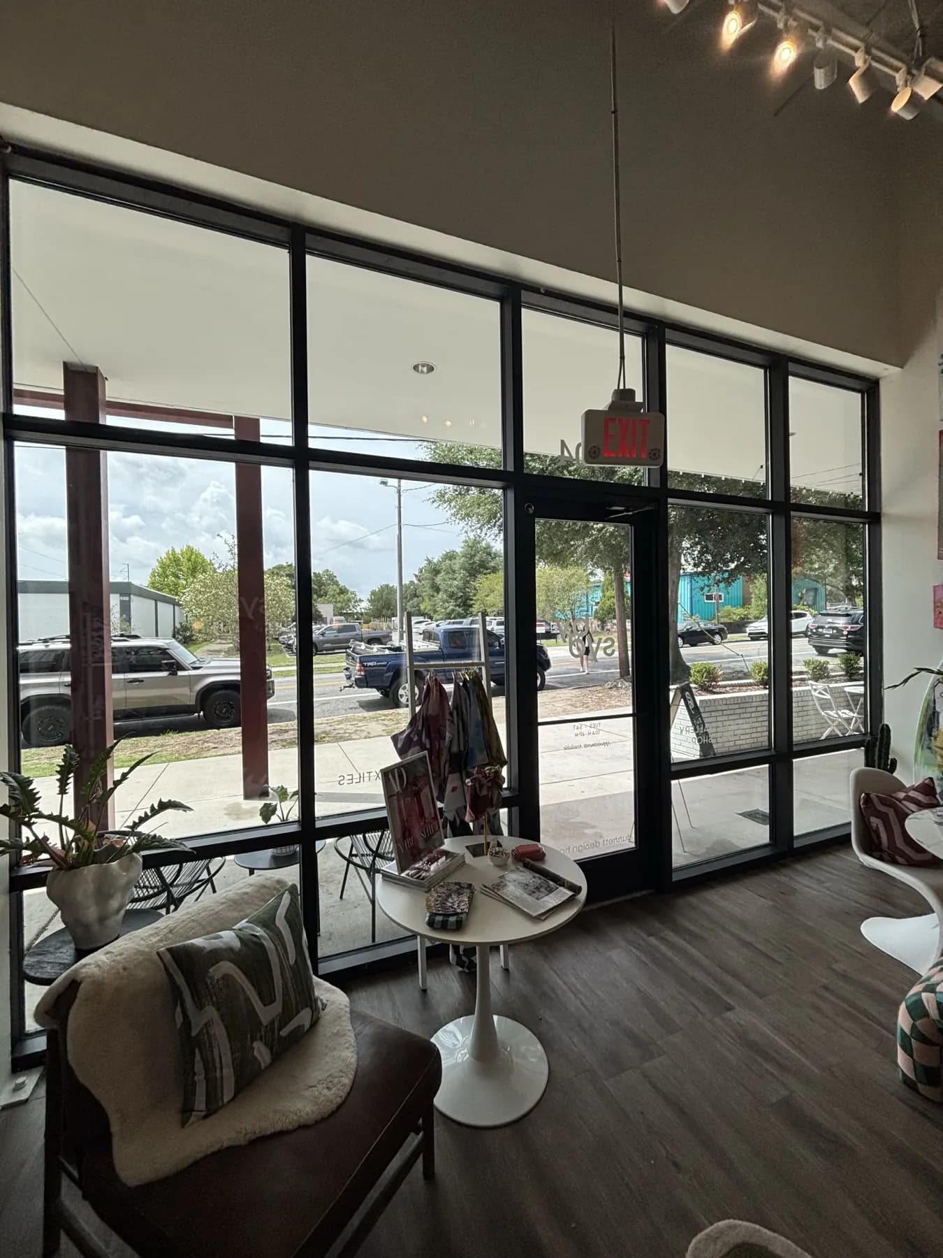 Commercial storefront with full-height glass looking onto a street
